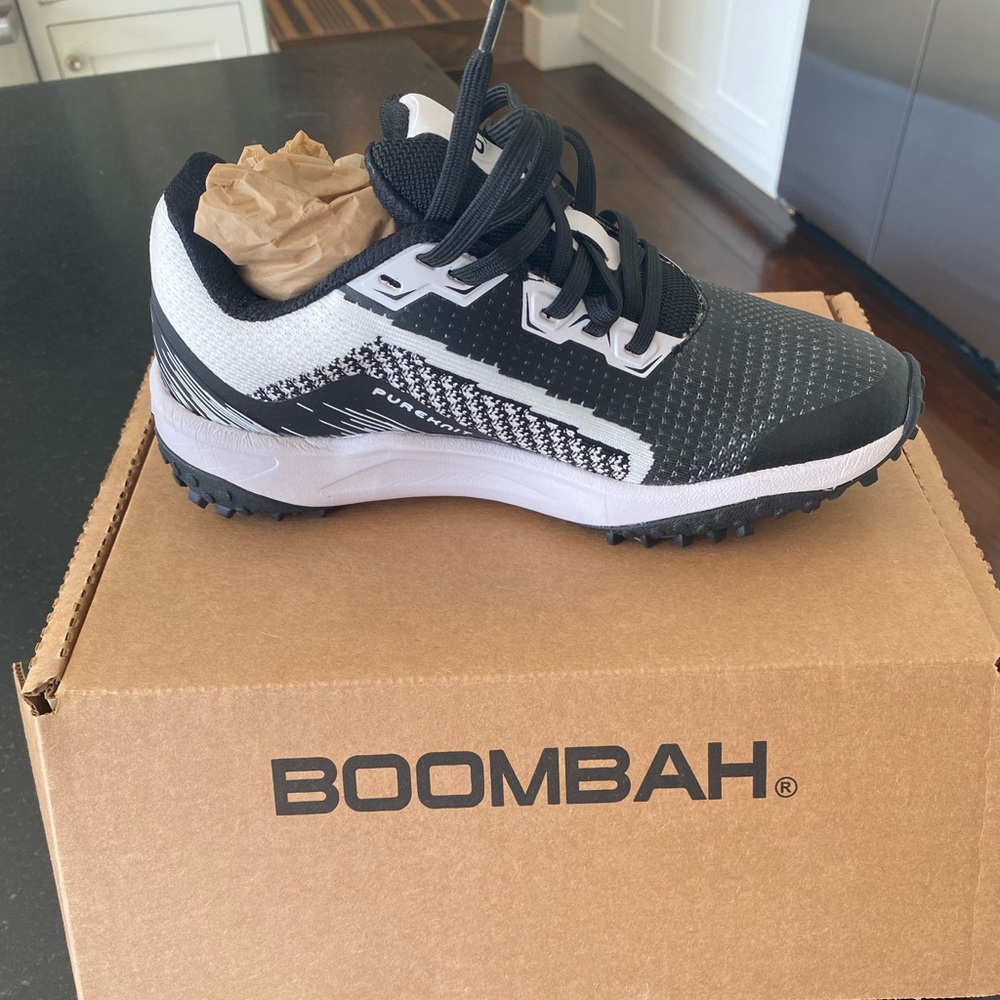 Women’s softball turf shoes. Brand new In box. Never worn. Size 6.
